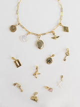 Rise Gold Charm | Wanderlust + Co