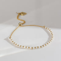 Howlite Gemstone Gold Beaded Sliding Bracelet | Wanderlust + Co 