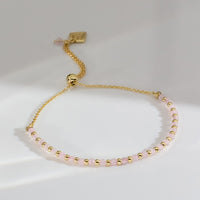 Rose Quartz Gemstone Gold Beaded Sliding Bracelet | Wanderlust + Co 