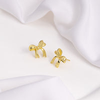 Bow Gold Stud Earrings | Wanderlust + Co