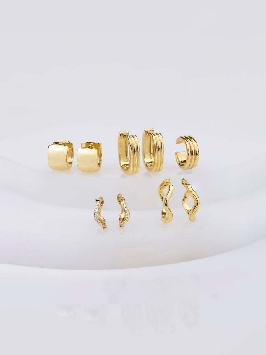 Classic Bold Gold 7mm Baby Huggie Earrings | Wanderlust + Co