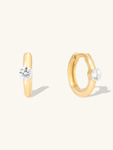 Floating Diamond 14K Solid Gold 10mm Huggie Earrings | Wanderlust + Co
