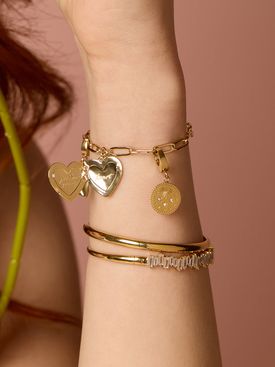 Rising Sun Gold Charm | Wanderlust + Co