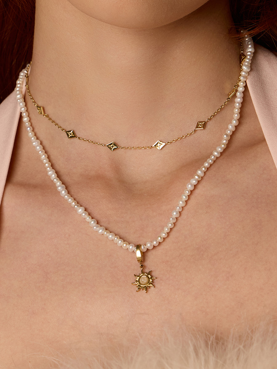 Sunray Ivory & Gold Charm | Wanderlust + Co
