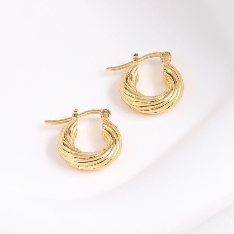 Gold hoop clearance earrings twist