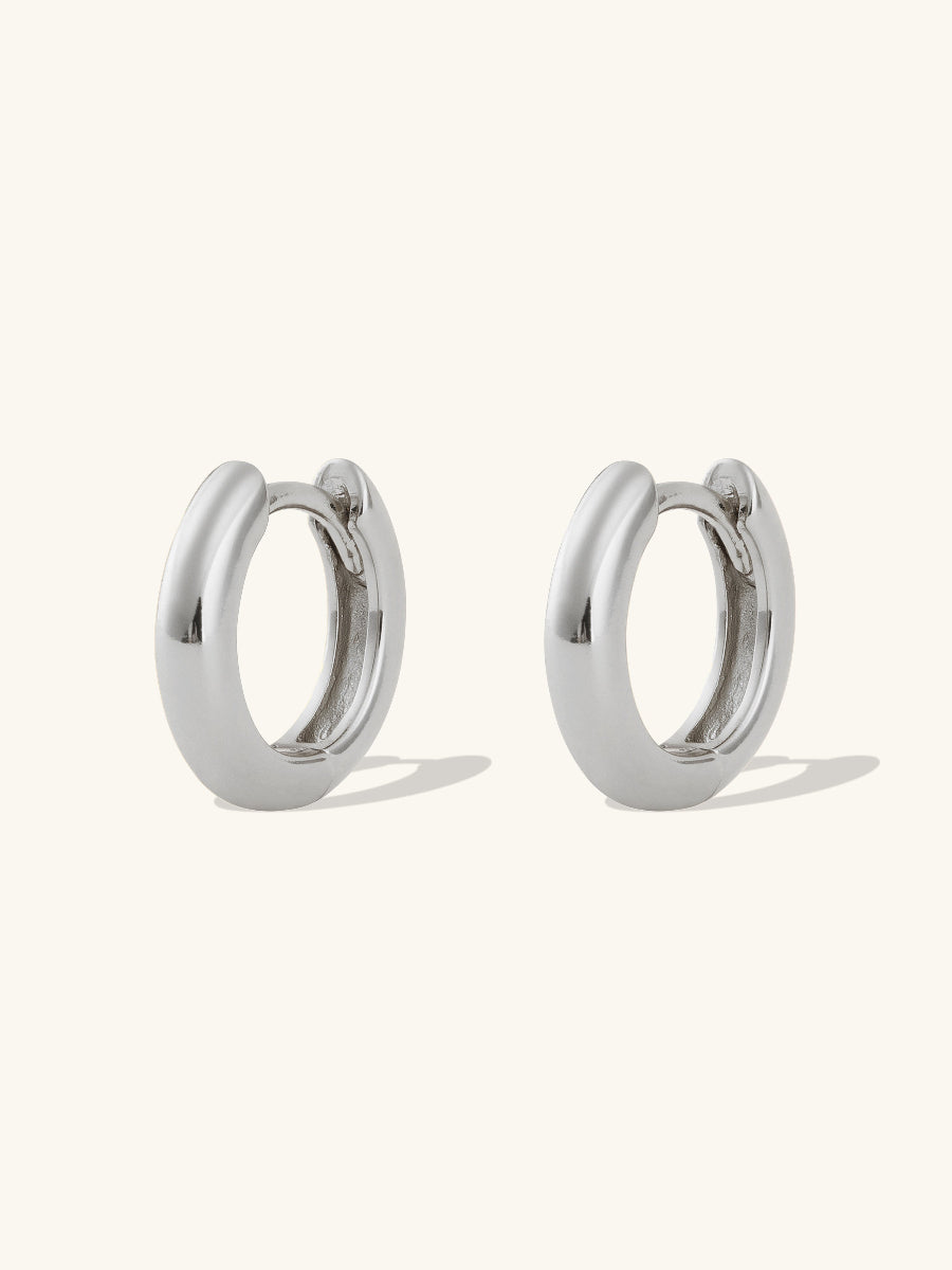 Classic Silver 7mm Baby Huggie Earrings | Wanderlust + Co
