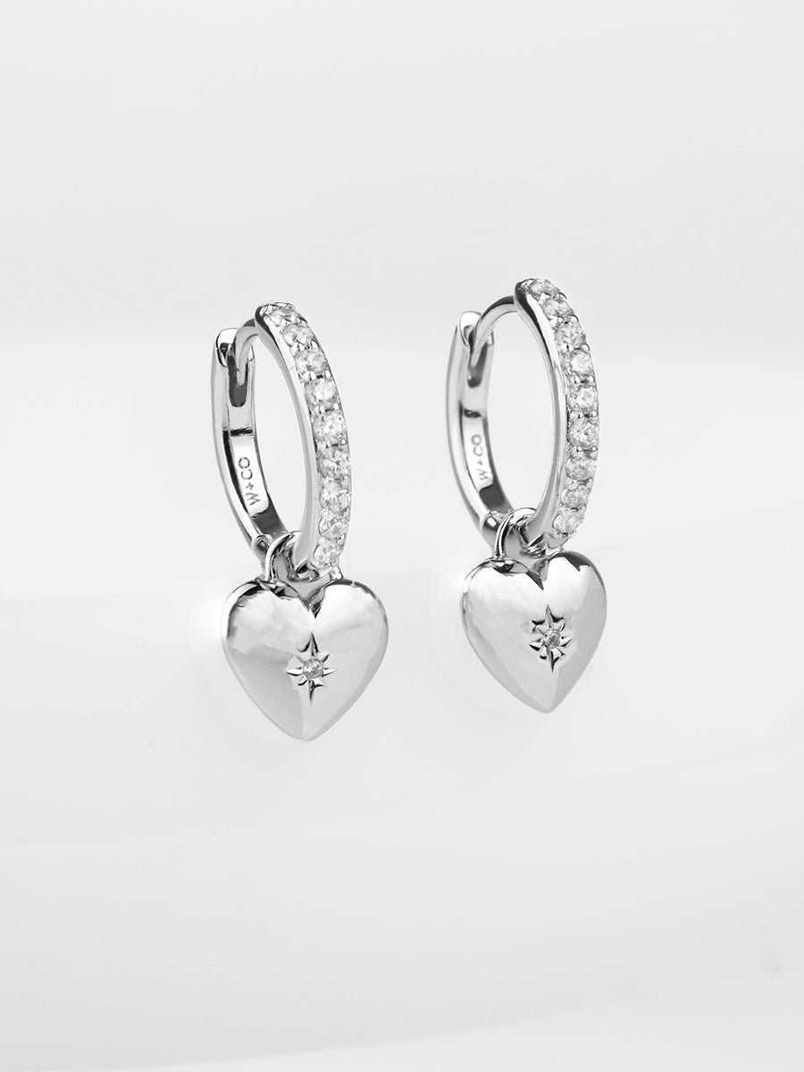 Heart Charm Silver Huggie Earrings | Wanderlust + Co