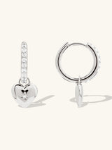 Heart Charm Silver Huggie Earrings | Wanderlust + Co