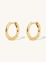 Eternity 14K Solid Gold 10mm Huggie Earrings | Wanderlust + Co