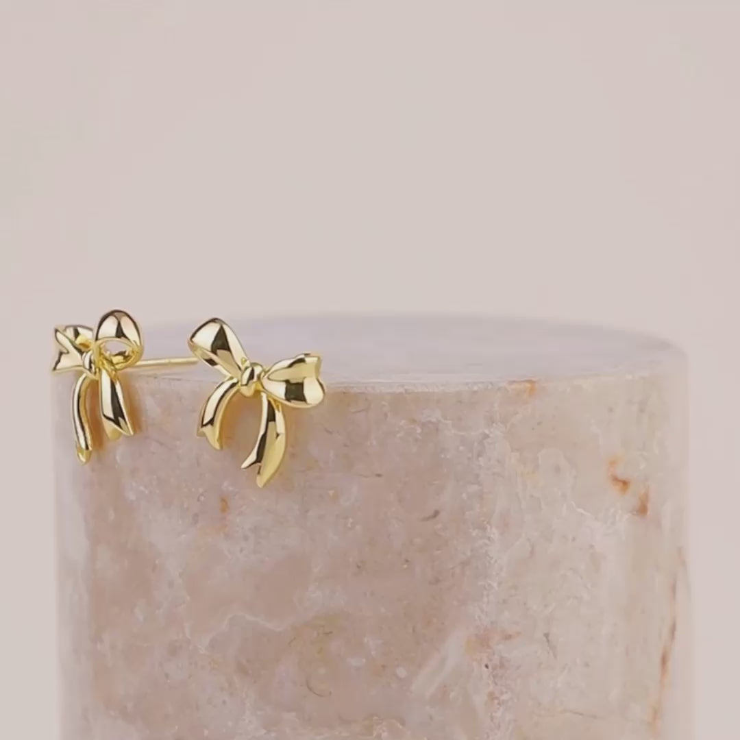 Bow Gold Stud Earrings | Wanderlust + Co