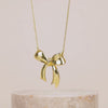 Bow Gold Necklace | Wanderlust + Co