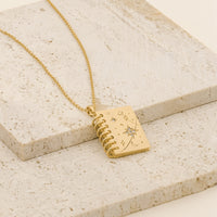 Moments Notebook Gold Necklace | Wanderlust + Co 